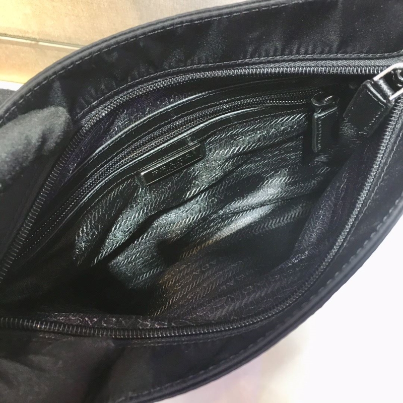 mens Pra*a satchel bags